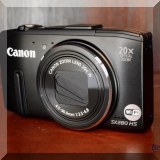 E22. Canon SX280HS camera.